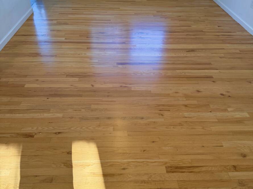 wood floor refinishing in progress in a North NJ home